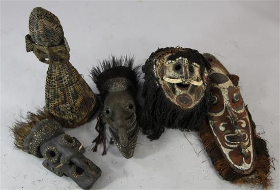 Five Sepik River wooden/rattan tribal masks, various